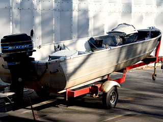 Bass Boat and Trailer from High Peak Deception Non-Fiction Novel by Marla Gates